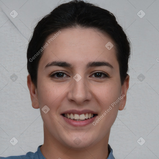 Joyful white young-adult female with short  brown hair and brown eyes