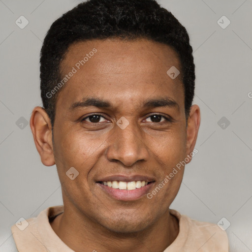 Joyful latino young-adult male with short  black hair and brown eyes