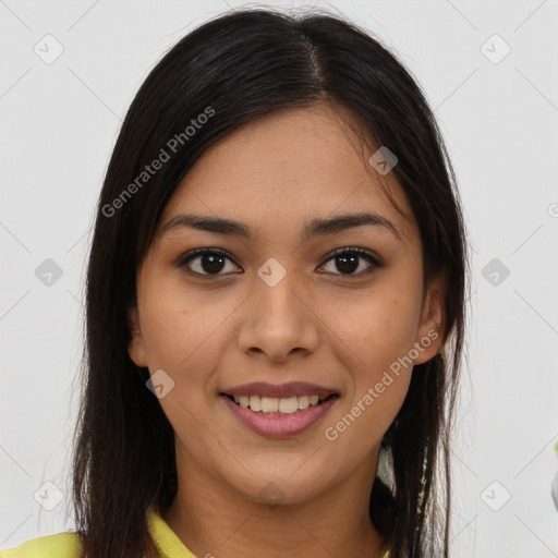 Joyful latino young-adult female with long  brown hair and brown eyes