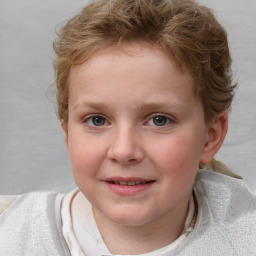 Joyful white child female with short  brown hair and blue eyes