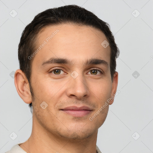 Joyful white young-adult male with short  brown hair and brown eyes