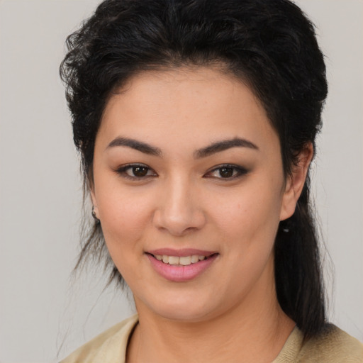 Joyful white young-adult female with medium  brown hair and brown eyes