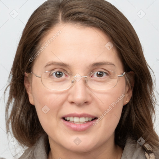 Joyful white adult female with medium  brown hair and grey eyes