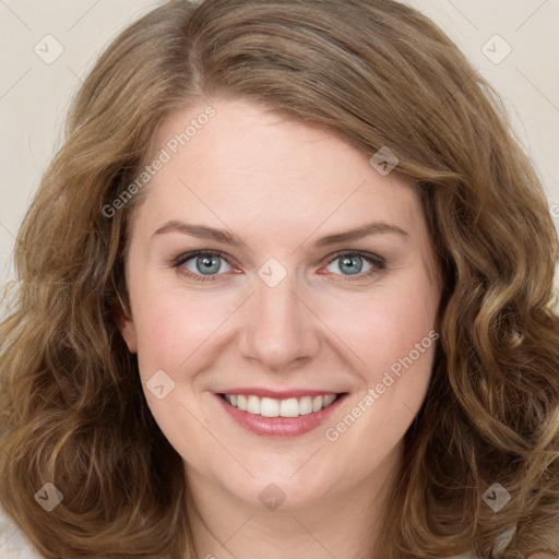 Joyful white young-adult female with long  brown hair and green eyes