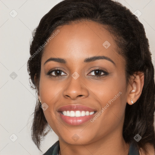 Joyful latino young-adult female with long  brown hair and brown eyes