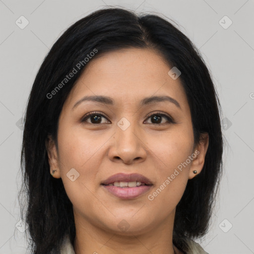 Joyful latino young-adult female with long  brown hair and brown eyes