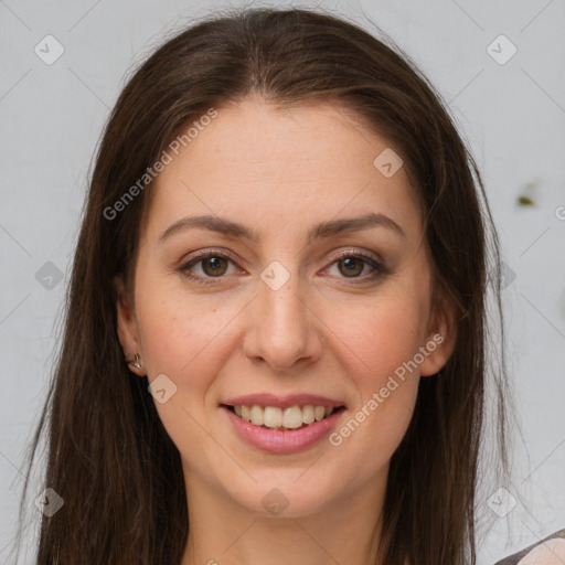 Joyful white young-adult female with long  brown hair and brown eyes