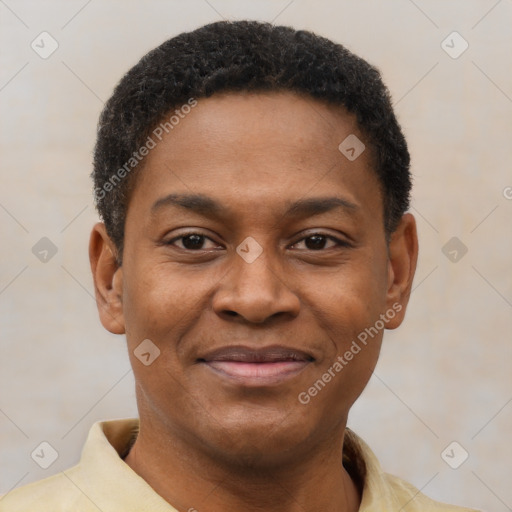 Joyful latino young-adult male with short  brown hair and brown eyes