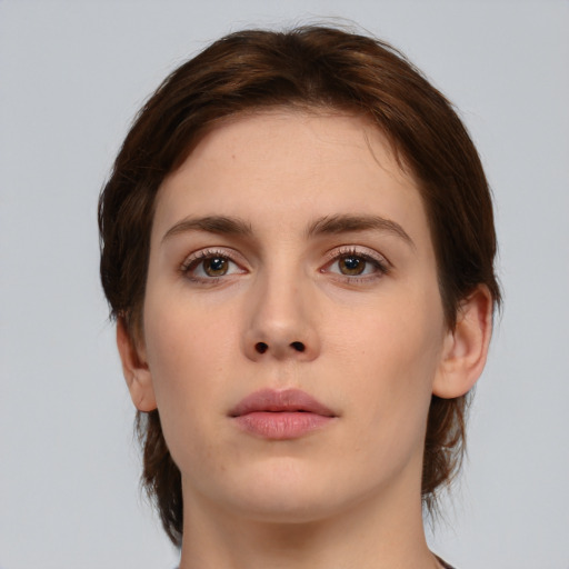 Neutral white young-adult female with medium  brown hair and brown eyes