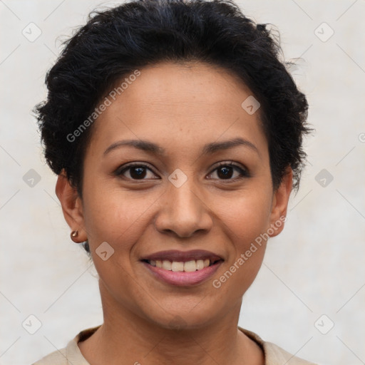 Joyful latino adult female with short  brown hair and brown eyes