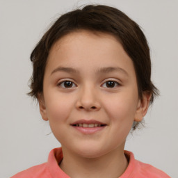 Joyful white child female with short  brown hair and brown eyes