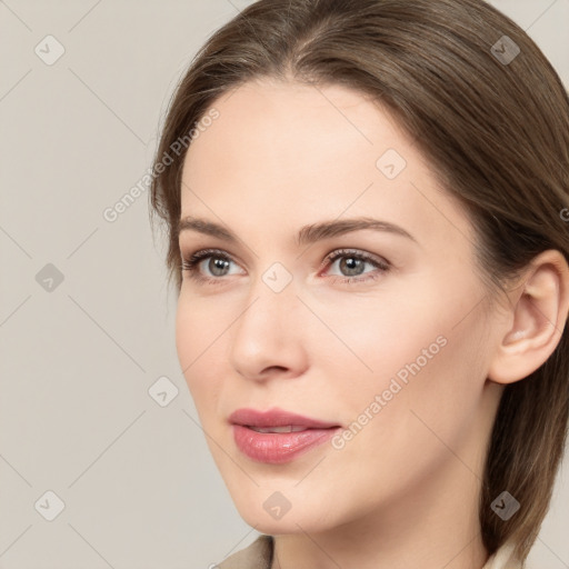 Neutral white young-adult female with medium  brown hair and brown eyes