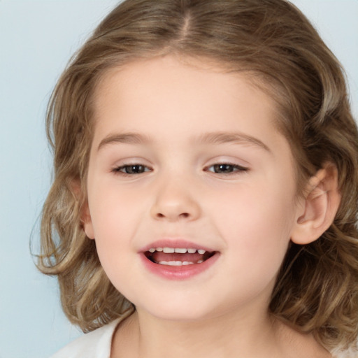 Joyful white child female with medium  brown hair and brown eyes