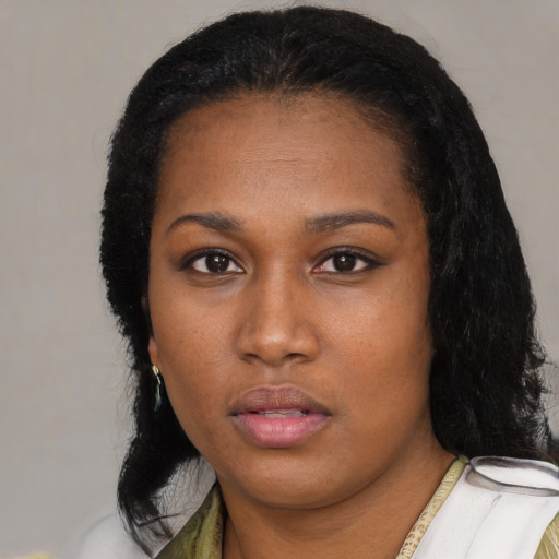 Neutral black young-adult female with medium  black hair and brown eyes