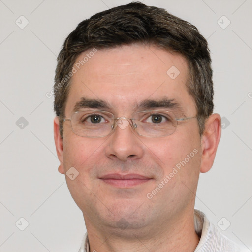 Joyful white adult male with short  brown hair and grey eyes