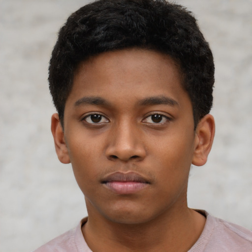 Neutral black child male with short  black hair and brown eyes