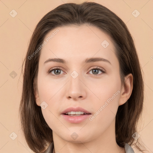 Neutral white young-adult female with medium  brown hair and brown eyes