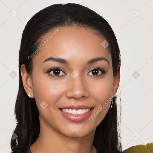 Joyful latino young-adult female with long  brown hair and brown eyes