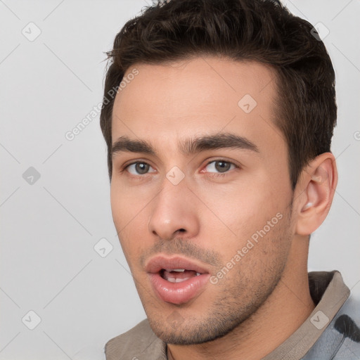 Neutral white young-adult male with short  brown hair and brown eyes