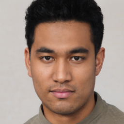 Neutral asian young-adult male with short  black hair and brown eyes