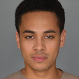 Neutral latino young-adult male with short  brown hair and brown eyes
