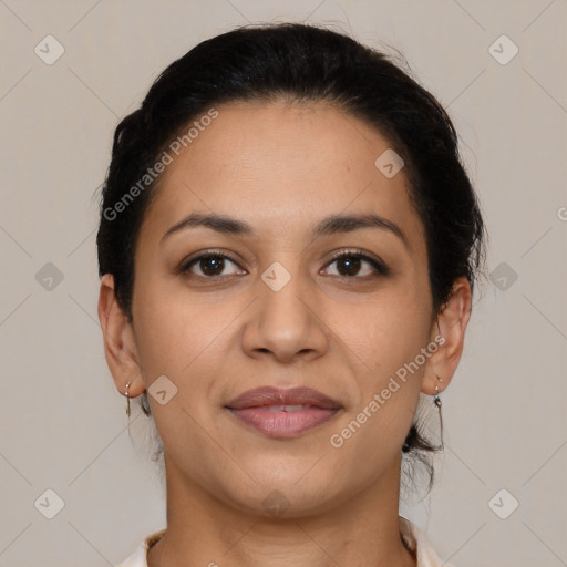 Joyful latino young-adult female with short  brown hair and brown eyes