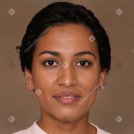 Joyful latino young-adult female with short  brown hair and brown eyes