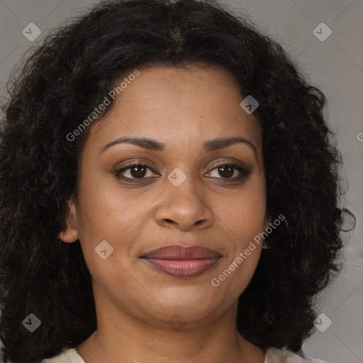 Joyful black young-adult female with medium  brown hair and brown eyes