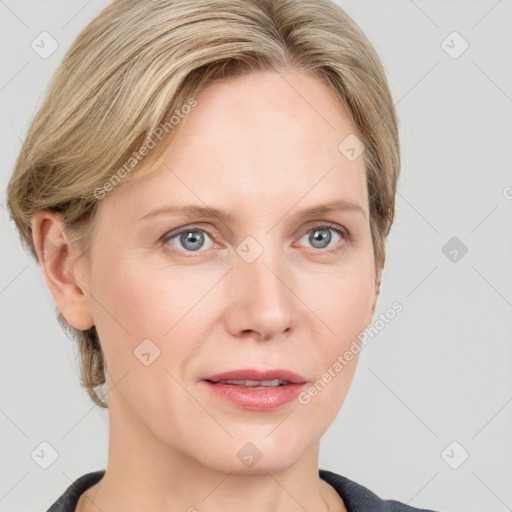 Joyful white young-adult female with medium  brown hair and blue eyes