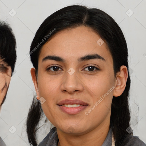 Joyful asian young-adult female with medium  black hair and brown eyes