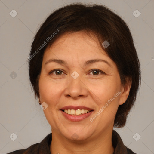 Joyful white adult female with medium  brown hair and brown eyes