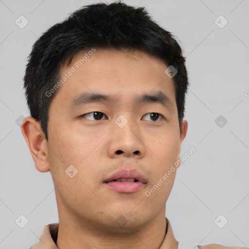 Neutral asian young-adult male with short  brown hair and brown eyes