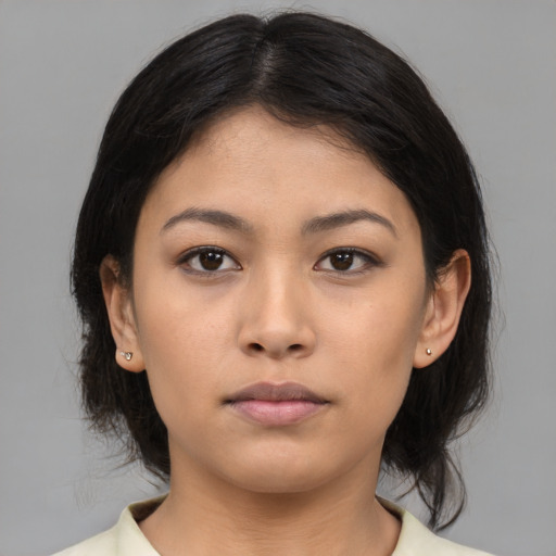 Neutral asian young-adult female with medium  black hair and brown eyes