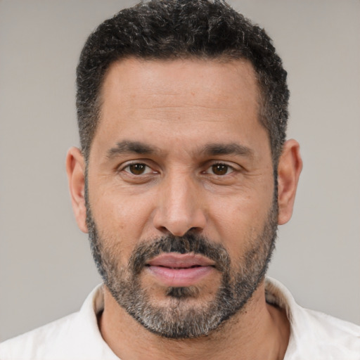 Neutral white adult male with short  black hair and brown eyes