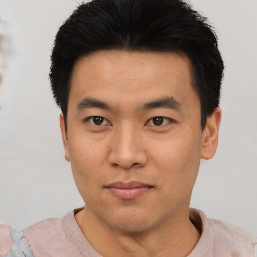 Neutral asian young-adult male with short  black hair and brown eyes