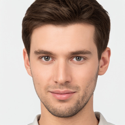 Neutral white young-adult male with short  brown hair and brown eyes