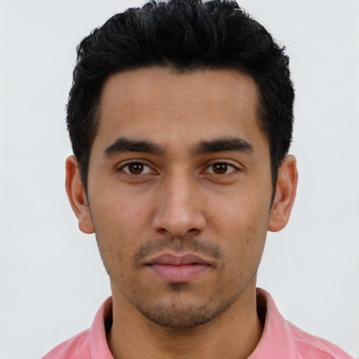 Neutral latino young-adult male with short  black hair and brown eyes