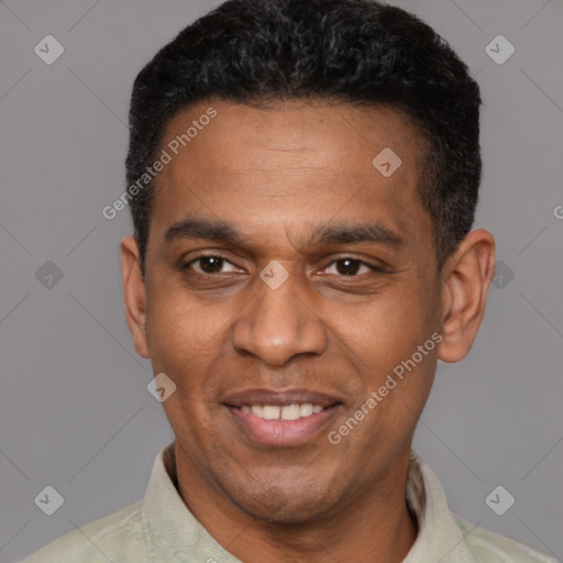 Joyful latino adult male with short  black hair and brown eyes