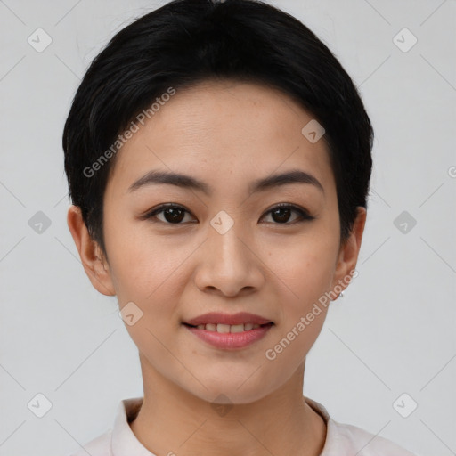 Joyful asian young-adult female with short  black hair and brown eyes