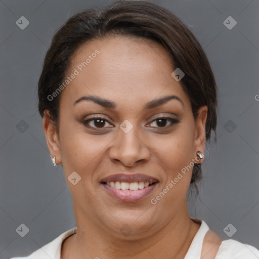 Joyful black young-adult female with short  brown hair and brown eyes