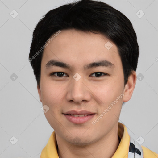 Joyful asian young-adult male with short  black hair and brown eyes