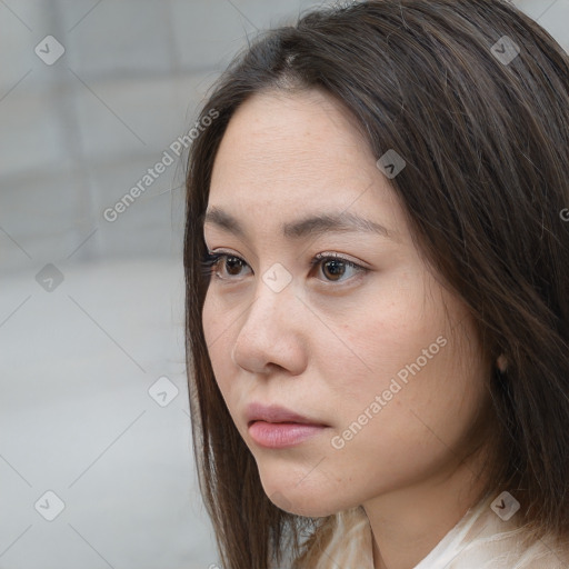 Neutral white young-adult female with long  brown hair and brown eyes