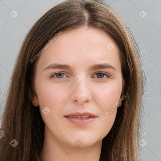 Joyful white young-adult female with long  brown hair and grey eyes