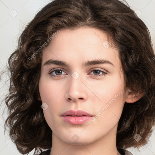 Neutral white young-adult female with medium  brown hair and brown eyes