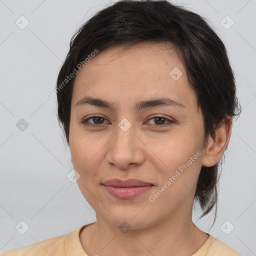 Joyful white young-adult female with medium  brown hair and brown eyes