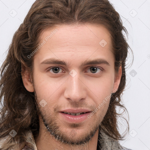 Neutral white young-adult male with long  brown hair and brown eyes