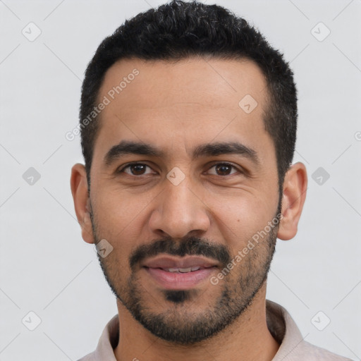 Joyful latino young-adult male with short  black hair and brown eyes