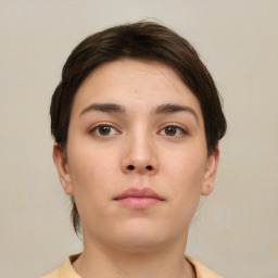 Neutral white young-adult female with short  brown hair and brown eyes