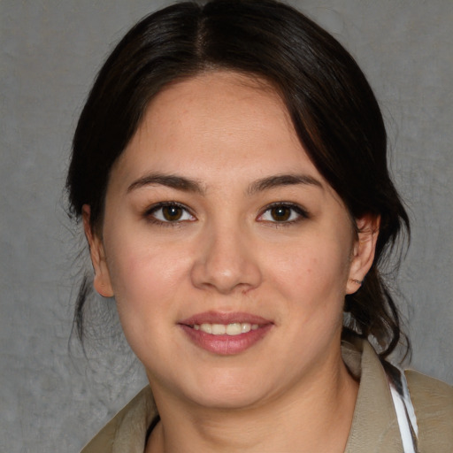 Joyful white young-adult female with medium  brown hair and brown eyes