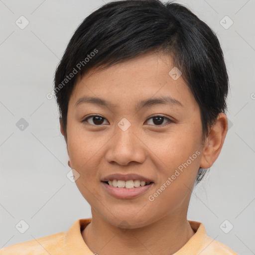 Joyful asian young-adult female with short  brown hair and brown eyes